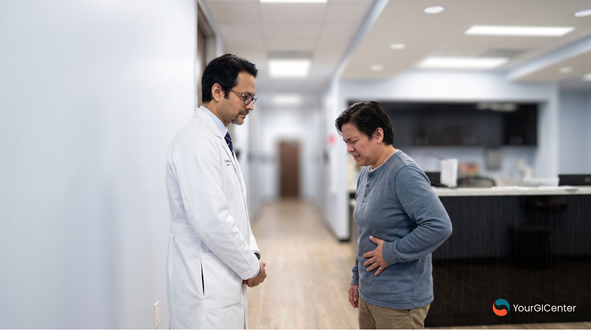 A compassionate gastroenterologist pearland texas evaluating a patient experiencing acute lower left abdominal pain down a clinic hallway corridor for an expert gi doctor pearland checkup.
