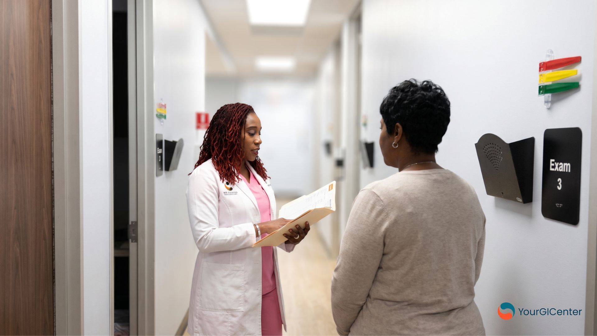 A supportive clinical nurse explaining diverticulosis prevention timelines to a patient during a consultation with a top gi doctor pearland provider from the best gastroenterologist pearland directory list.