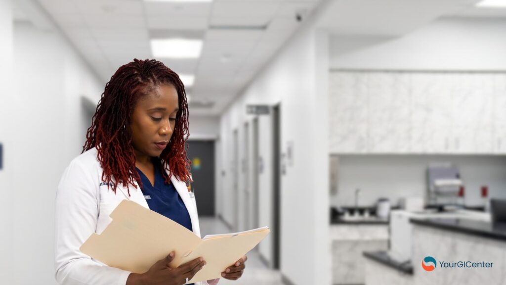 A supportive gi specialist pearland nurse evaluating a chronic constipation symptom timeline with a patient seeking specialized care near an office managed by a top gastroenterologist near webster tx.