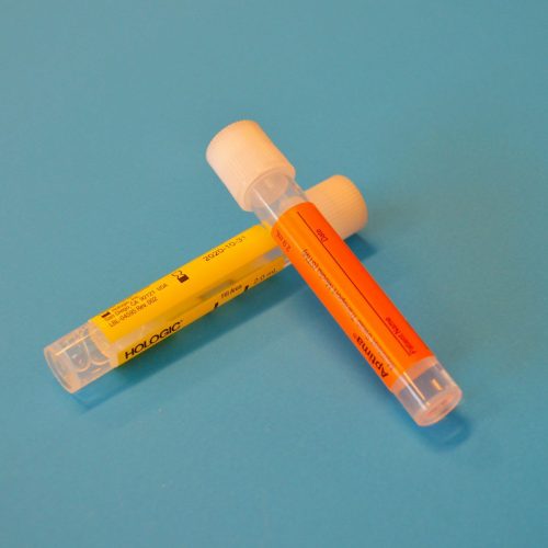 clear plastic tube on blue surface